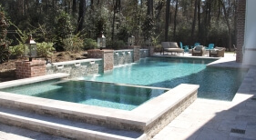 Geometric Pool, Spa, Sheer Descents, Wall, Water Feature, Stacked Stone, Gas Lanterns