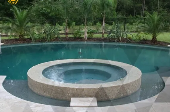 Luxury backyard pool with integrated spa and travertine patio design